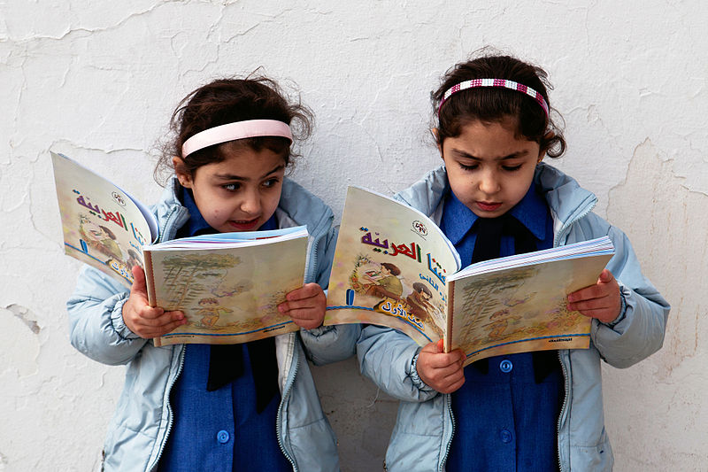 2011_education_for_all_global_monitoring_report_-government_primary_school_in_amman_jordan_-_young_girls_reading