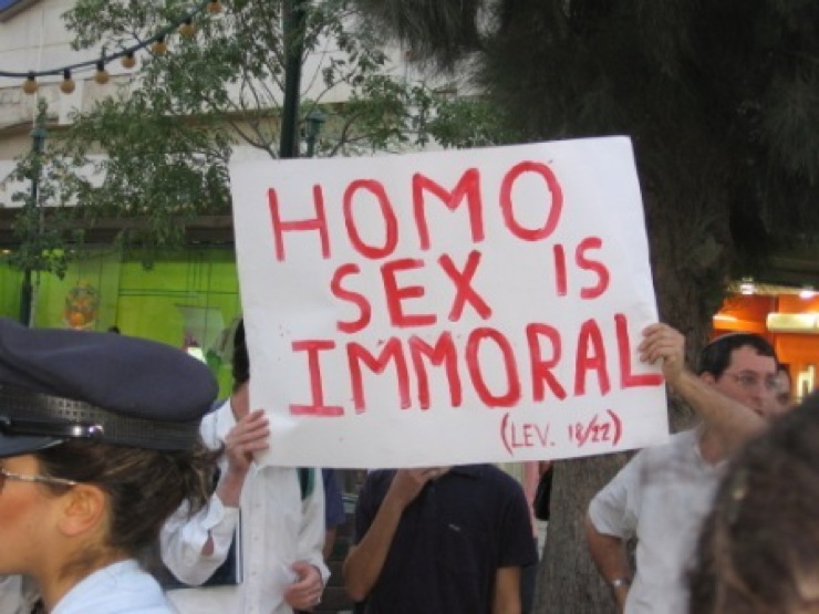 protestors_at_a_pride_parade_in_jerusalem_with_sign_that_reads_22homo_sex_is_immoral_lev