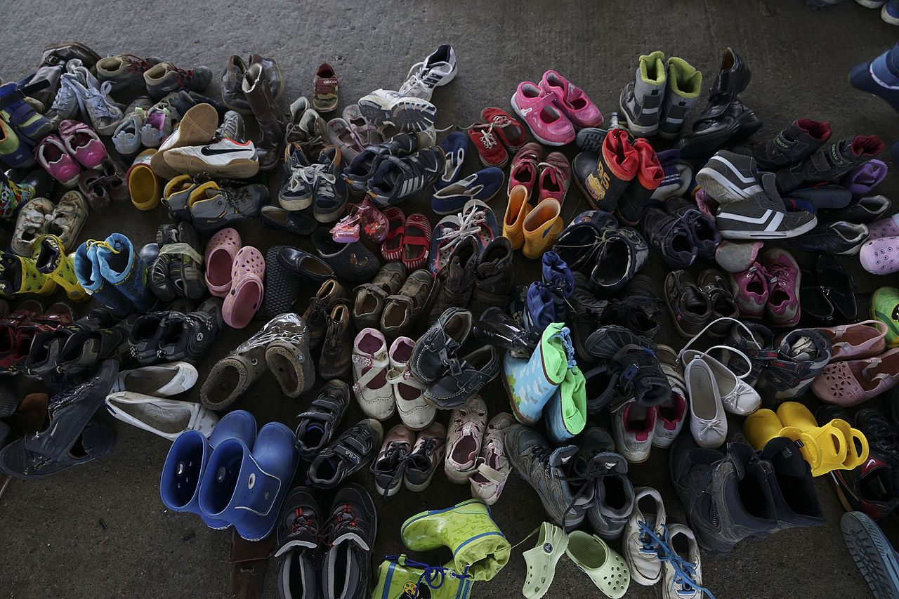 a_pile_of_children_shoes_captured_during_refugees_crisis