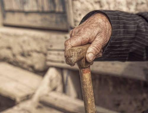 hand-of-a-old-man-holding-a-cane-000080300499_large