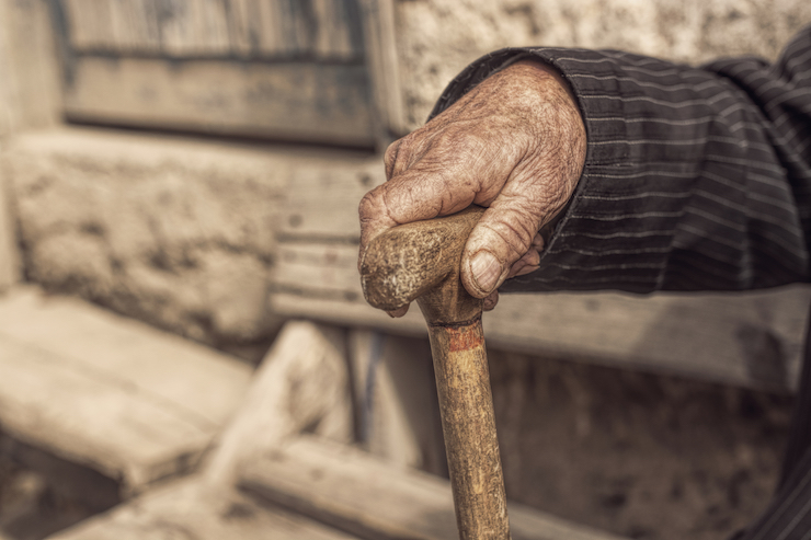 hand-of-a-old-man-holding-a-cane-000080300499_large