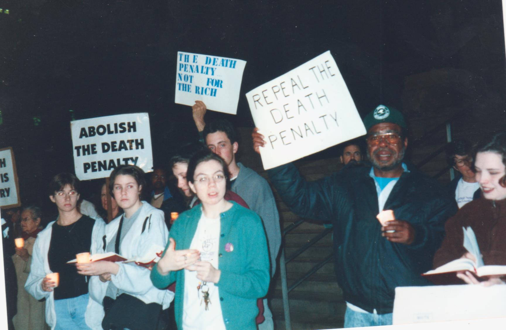 group_of_people_holding_signs_at_a_death_penalty_protest