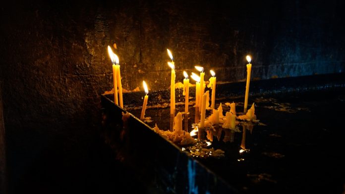candle-lit-sacrificial-lights-prayer-wax-church-1803143-696x392