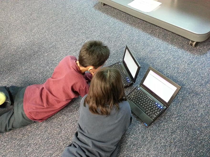 boy-girl-children-computer-learning-education-laptop-collaboration