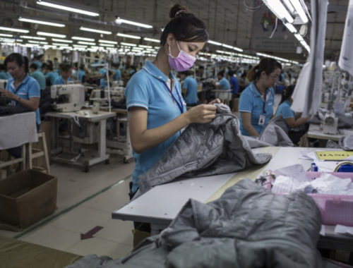 a-woman-works-on-a-clothing-line-making-winter-jackets-for-an-international-brand-in-a-garment-factory-in-dong-nai-province-vietnam