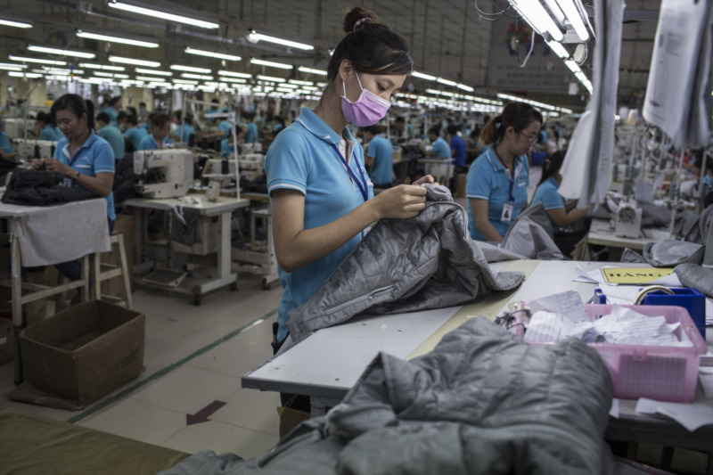 a-woman-works-on-a-clothing-line-making-winter-jackets-for-an-international-brand-in-a-garment-factory-in-dong-nai-province-vietnam