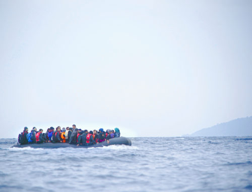 refugees_on_a_boat_crossing_the_mediterranean_sea_heading_from_turkish_coast_to_the_northeastern_greek_island_of_lesbos_29_january_2016